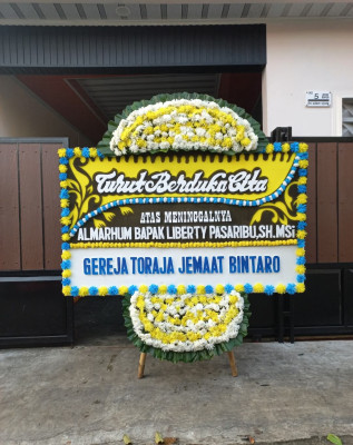 Papan Bunga Duka di Wano Barat